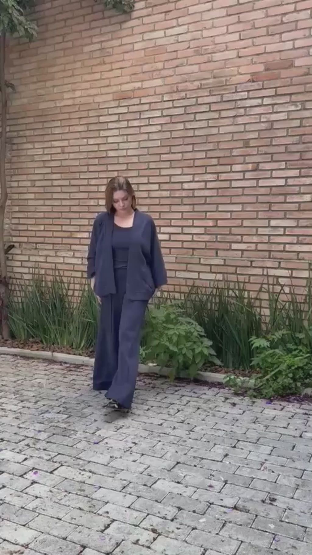 Calça pantalona com textura heritage